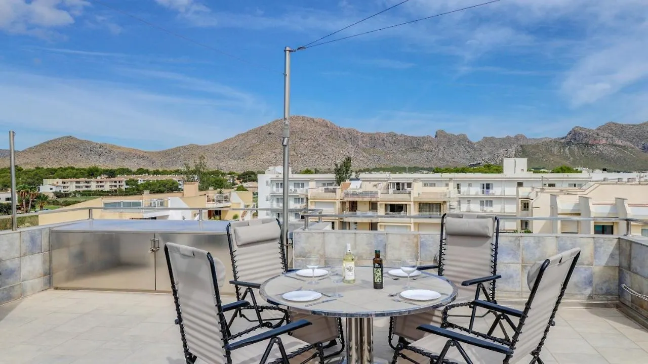 Seaside Oasis: Beachfront 2BR Apartment with Jacuzzi Terrace Port de Pollenca Spain