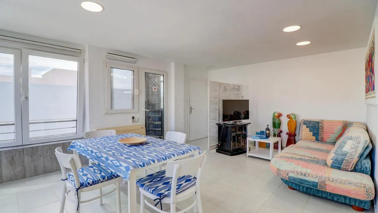 Seaside Oasis: Beachfront 2BR Apartment with Jacuzzi Terrace Port de Pollenca Spain